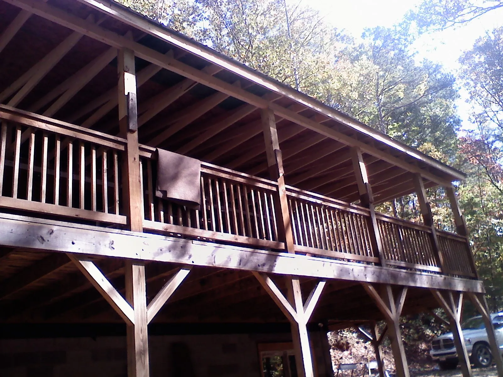 Timber framing under a new elevated porch and deck — Roof Leak Repair in Springtown by Roofing Brothers
